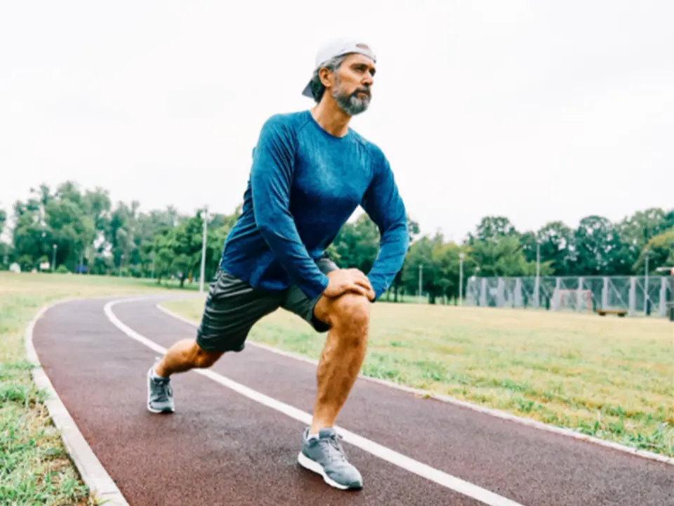 Man Op Atletiekbaan. Klaar Voor De Start